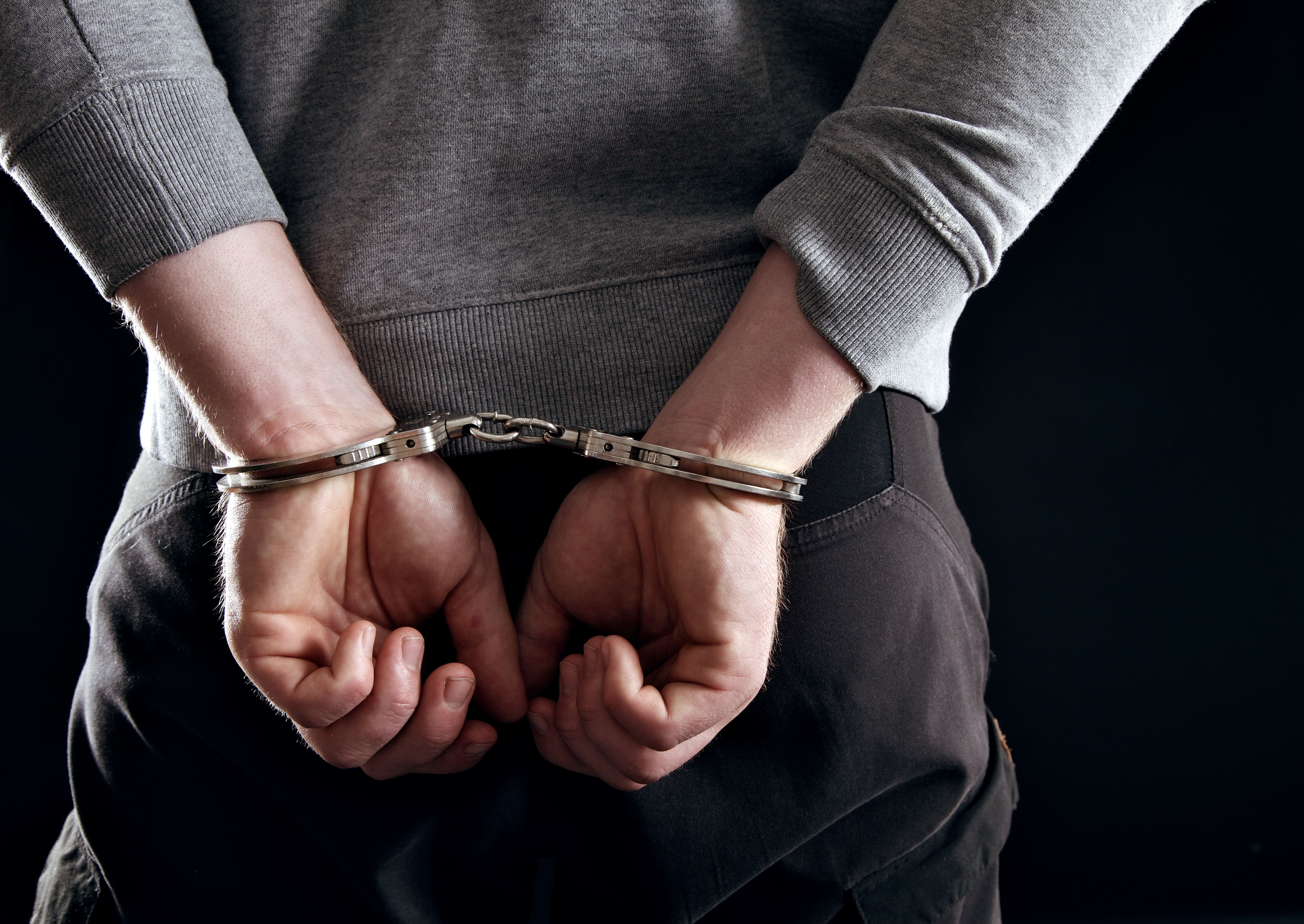 Handcuffed man - Florida sex crimes defense