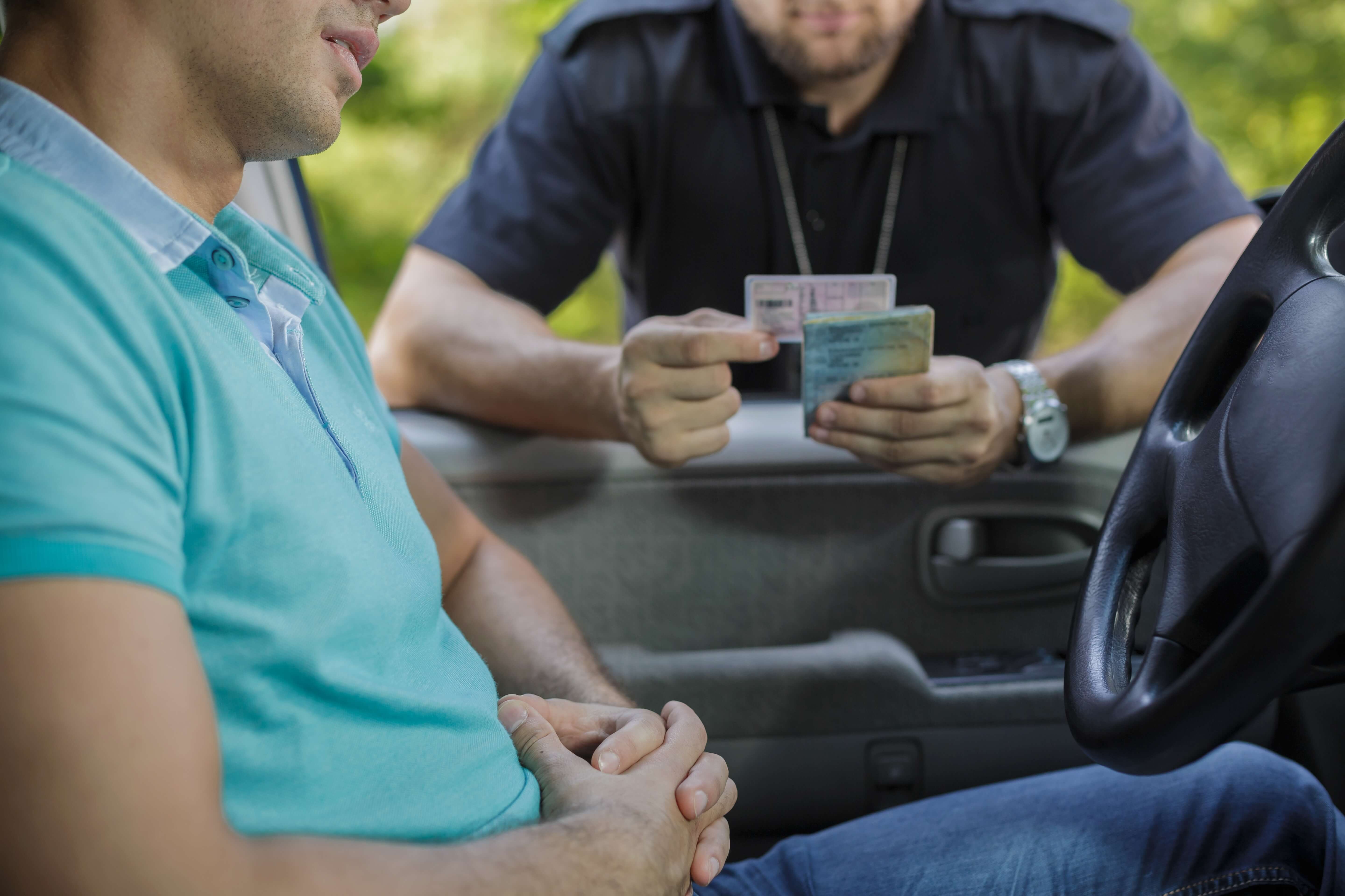 Man receiving a traffic ticket